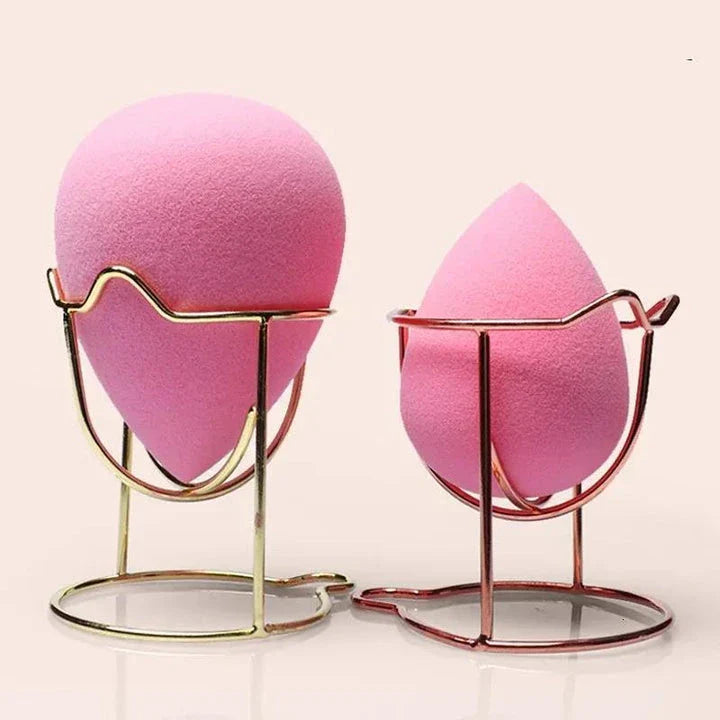 Elegant stainless steel makeup sponge drying rack in gold and rose gold finishes, designed to keep your beauty tools organised and fresh.