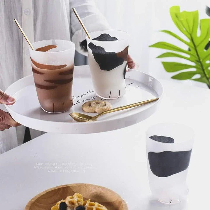 Charming cat paw shaped glass mug with a generous 301-400 ml capacity, perfect for enjoying your favourite hot beverage