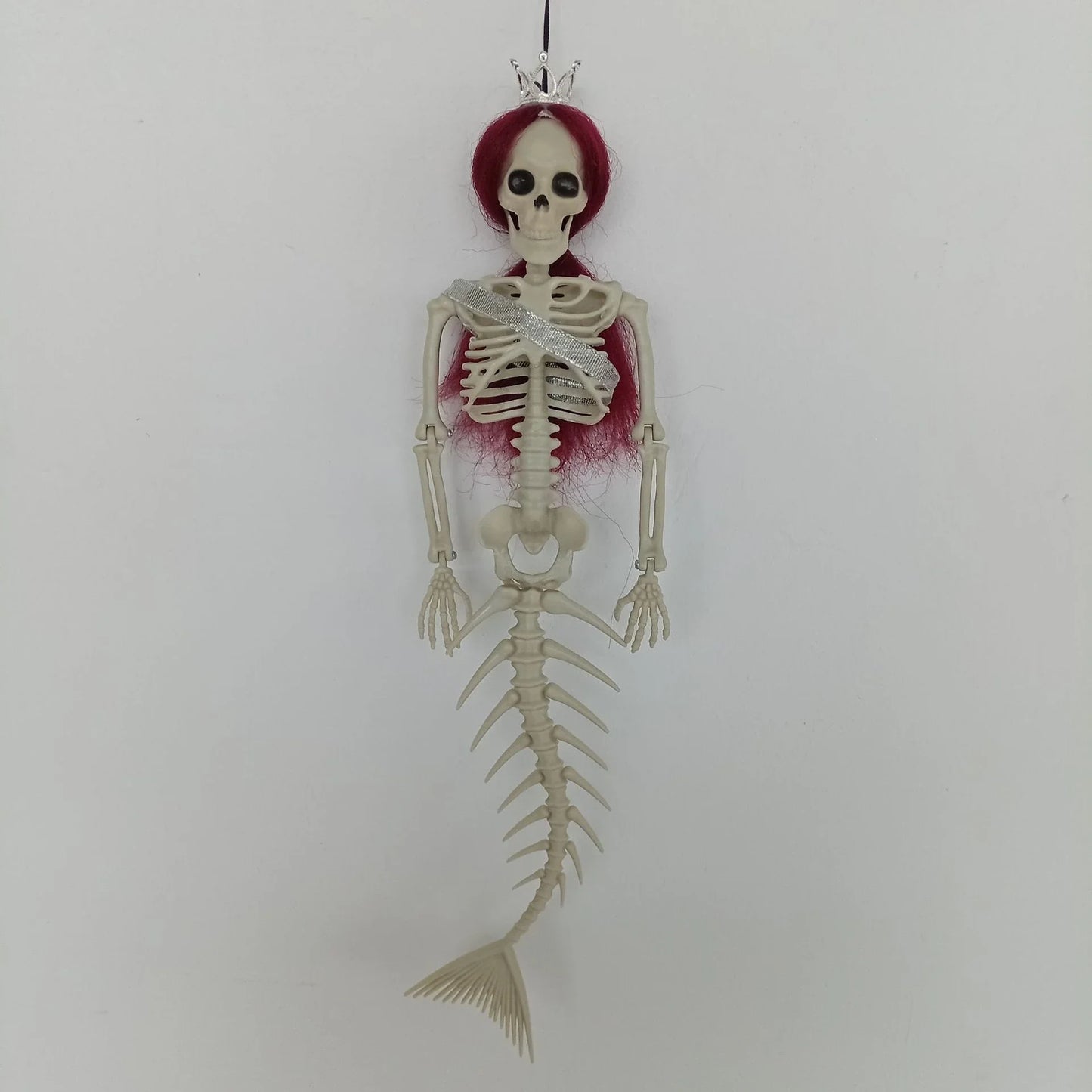 Mermaid bone pendant decoration in brown, dark purple, burgundy, and lake blue colours, ideal for Halloween outdoor courtyard displays