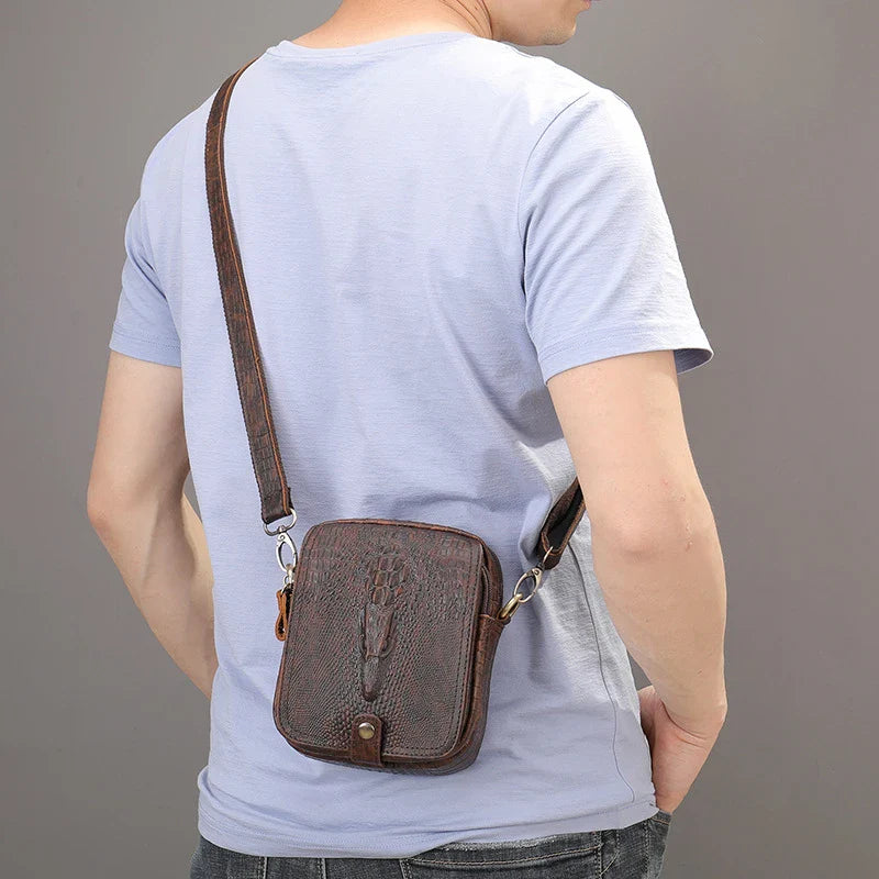 Premium cowhide leather diagonal shoulder bag for men, featuring a sophisticated box-shaped design and distinctive crocodile pattern