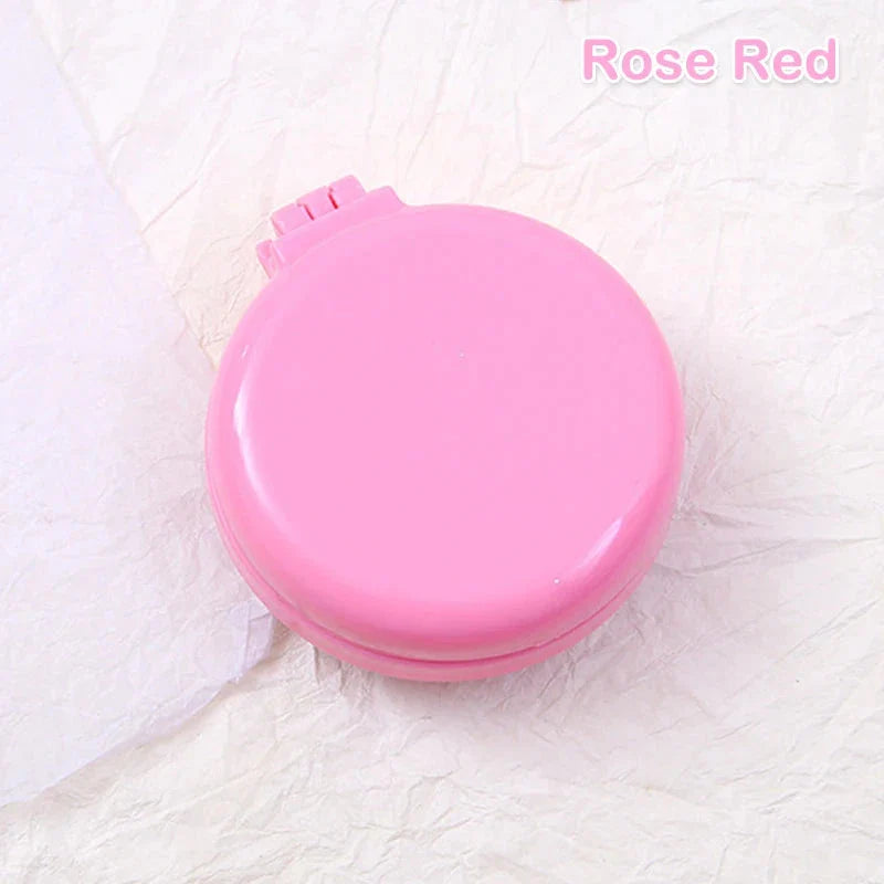 Compact folding hair comb with mirror, perfect for on-the-go touch-ups and styling for British customers