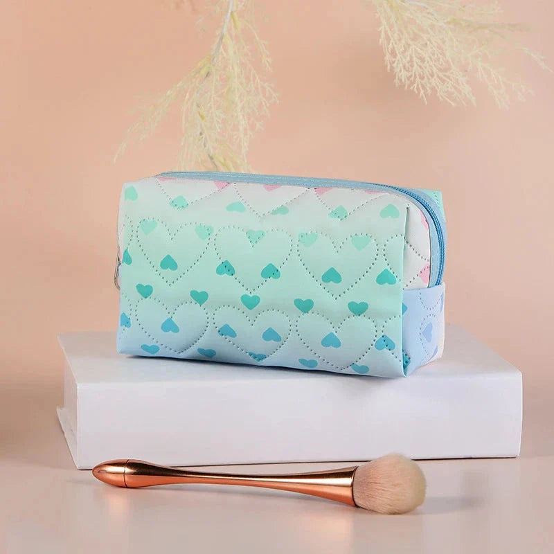 Stylish large-capacity waterproof cosmetic bag with heart pattern design, perfect for organising makeup, skincare, and travel essentials
