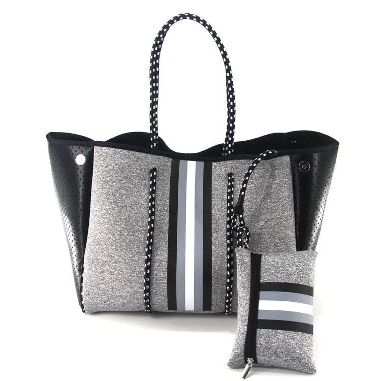 A neoprene beach bag in a stylish design, perfect for British summer adventures at the coast
