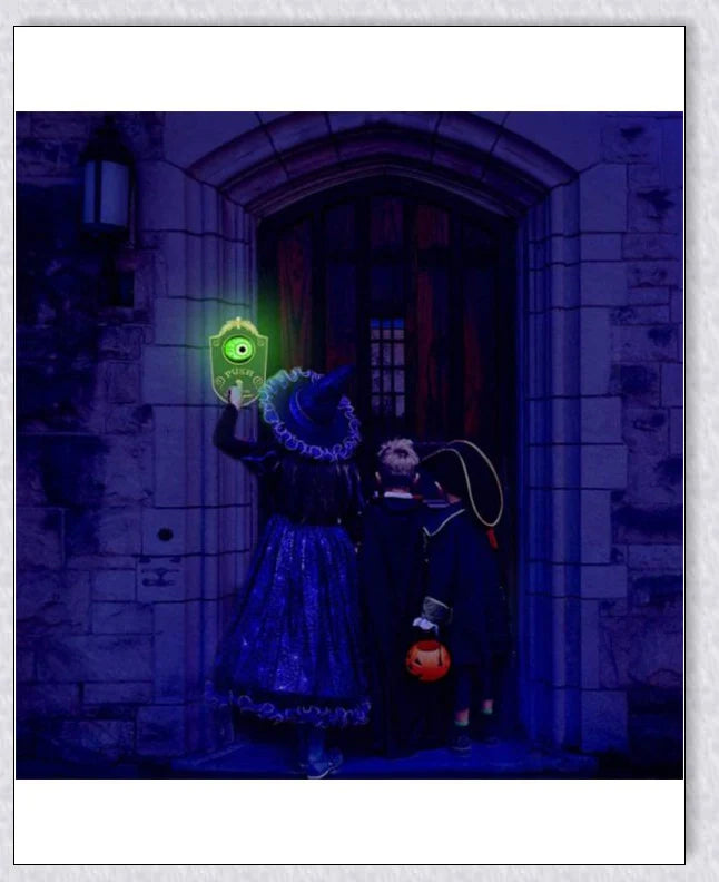 Spooky animated Halloween doorbell with a lifelike glowing green eyeball that peers out and greets guests