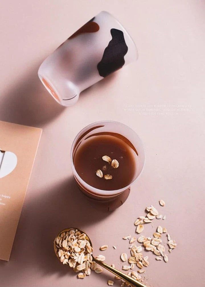 Charming cat paw shaped glass mug with a generous 301-400 ml capacity, perfect for enjoying your favourite hot beverage