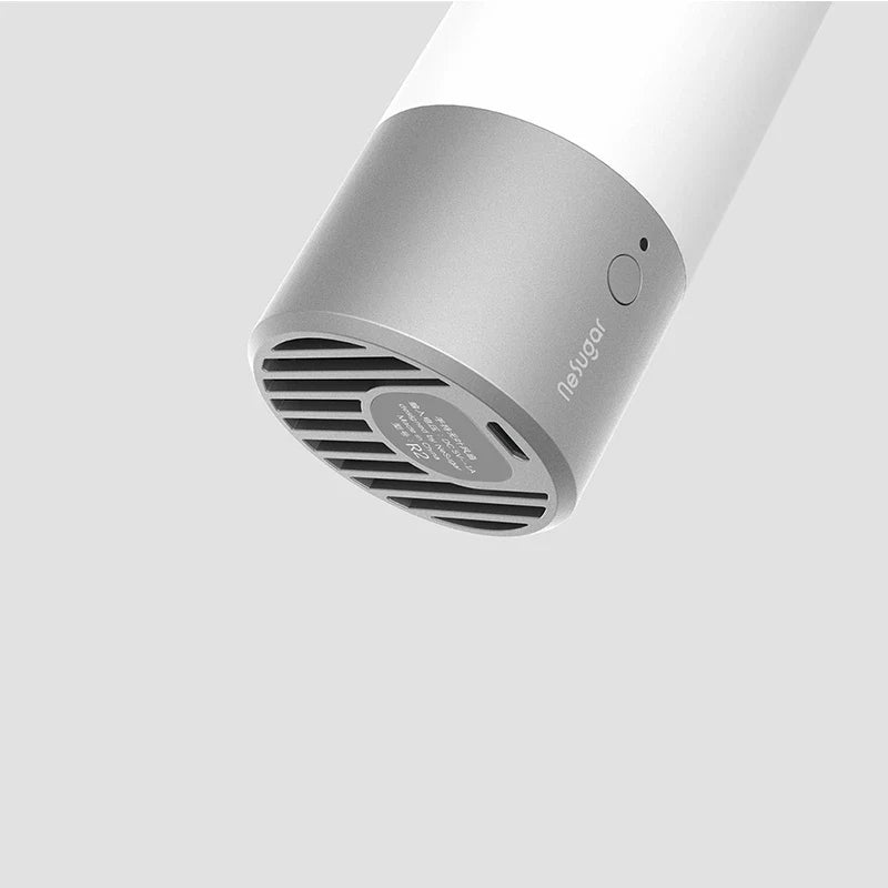 Compact, cordless, and bladeless fan with a sleek, white design and a powerful 900mAh battery for portable cooling.