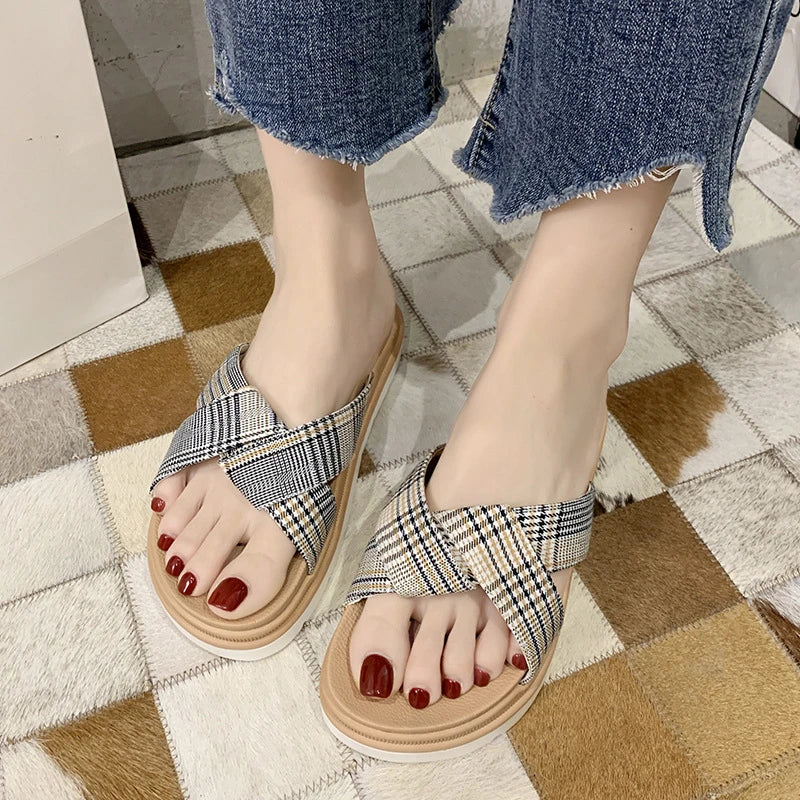 Premium non-slip herringbone slippers with a bow accent, featuring a canvas upper, fetal cowhide lining, and a rubber sole for comfort and stability.