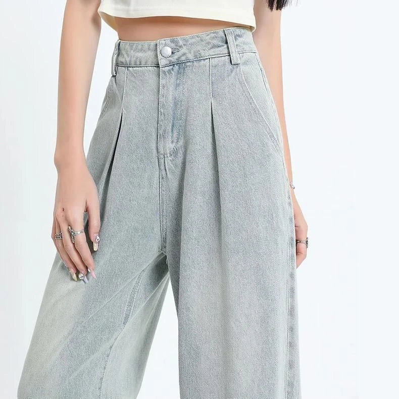 Premium high-waisted vintage straight leg women's jeans in a light wash finish with decorative details