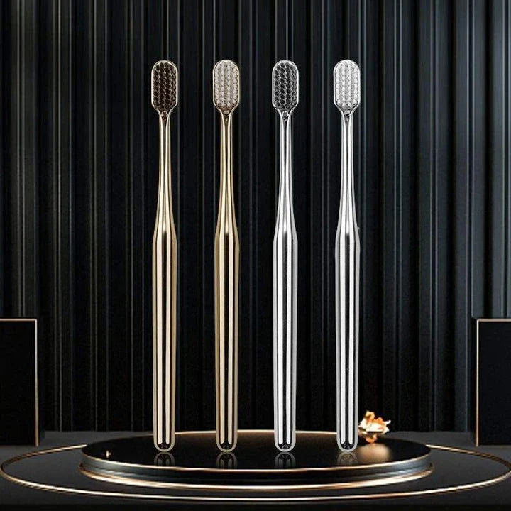 Elegant gold and silver toothbrush with soft bristles for superior dental hygiene