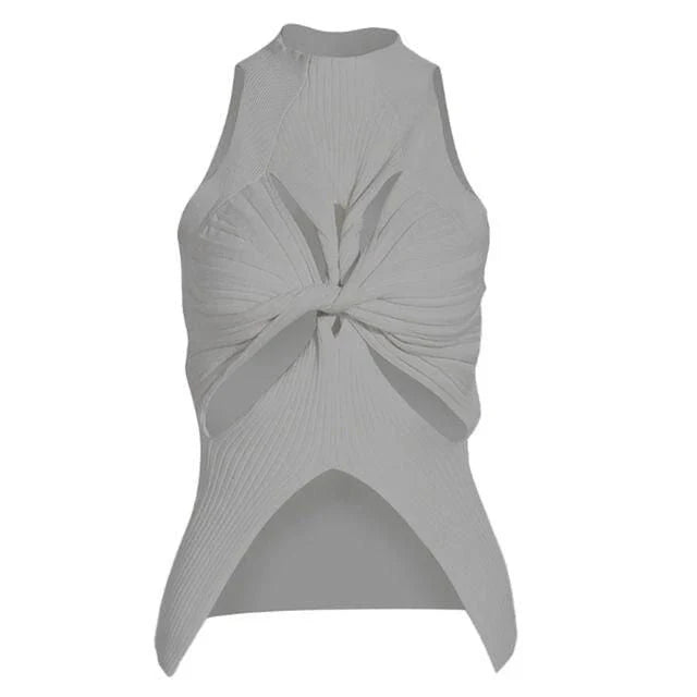 Elegant and versatile knitted sleeveless tank top with a unique hollow-out design, perfect for chic British style