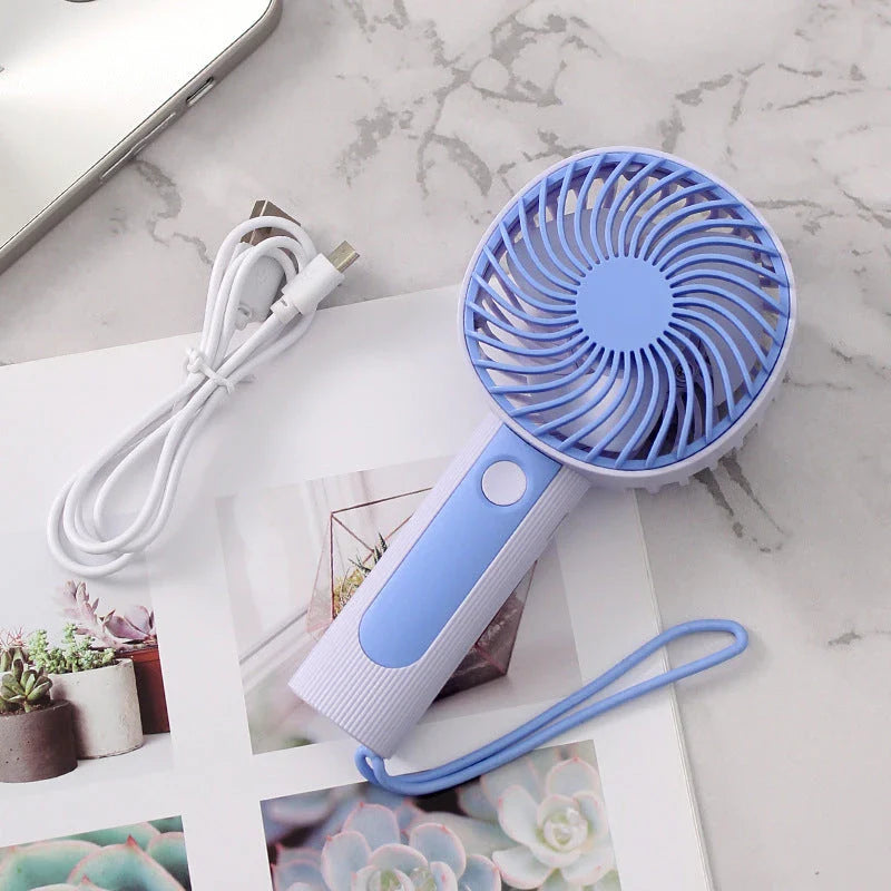 Mini Handheld USB Rechargeable Fan with 3 wind speed settings, rechargeable battery, and integrated night light