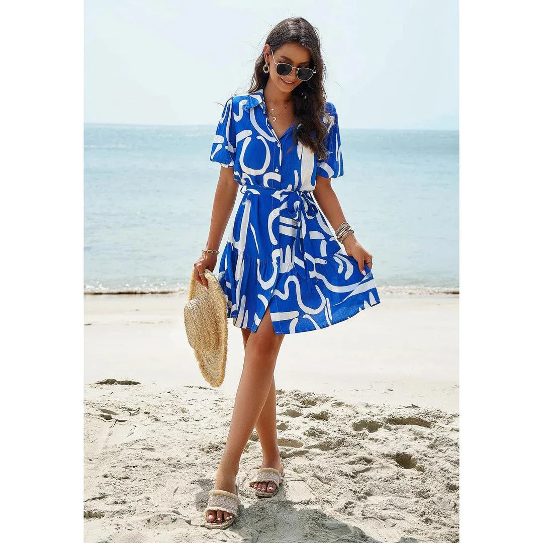 Elegant Geometric Print Mini Dress in Khaki with A-Line Silhouette and V-Neckline