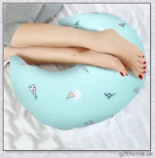 Premium breastfeeding nursing pillow with adjustable buckle, soft cotton fabric, and extra cushioning to support baby's head and prevent reflux.