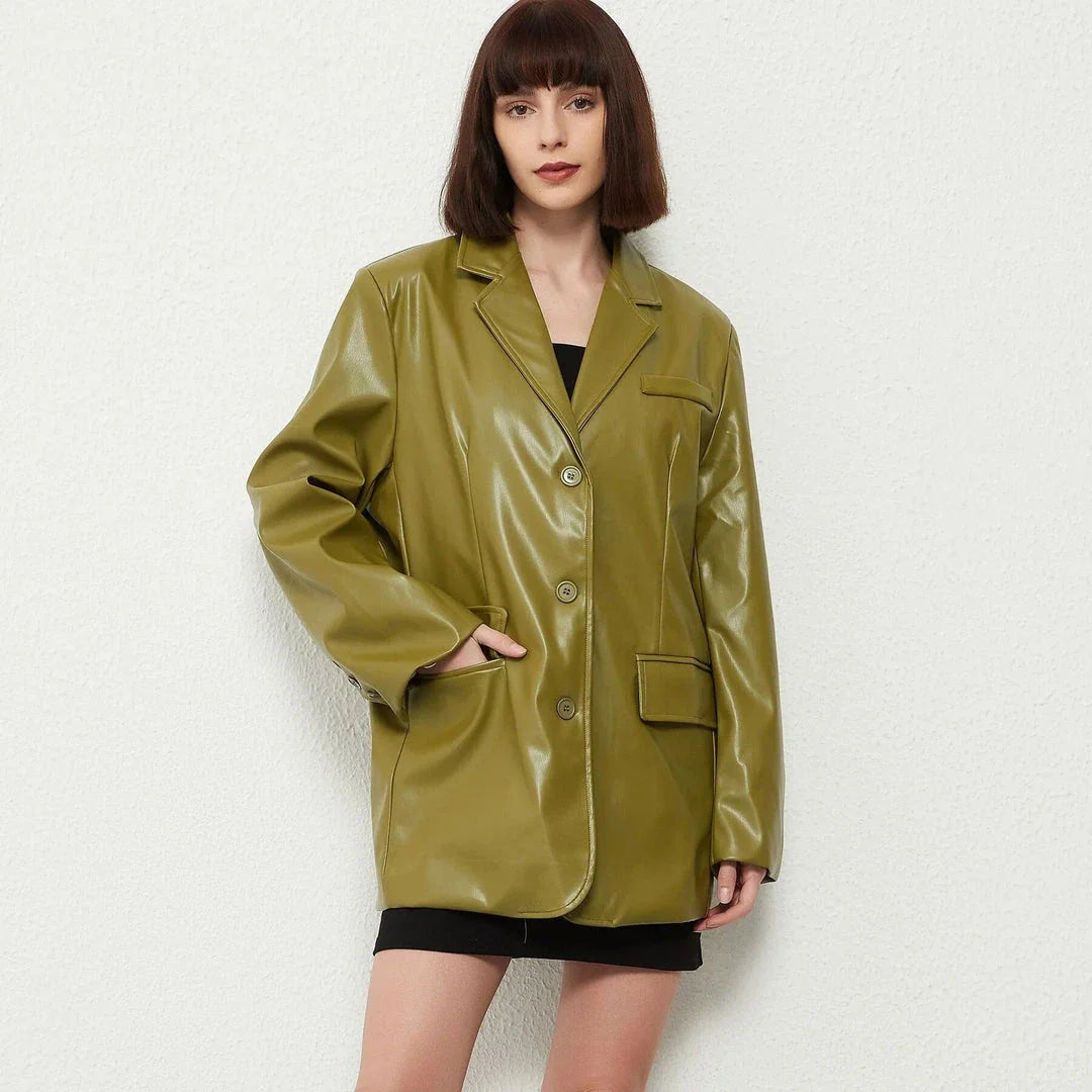 A vintage green single-breasted leather blazer jacket with a turn-down collar and regular sleeves, made from durable polyester material.