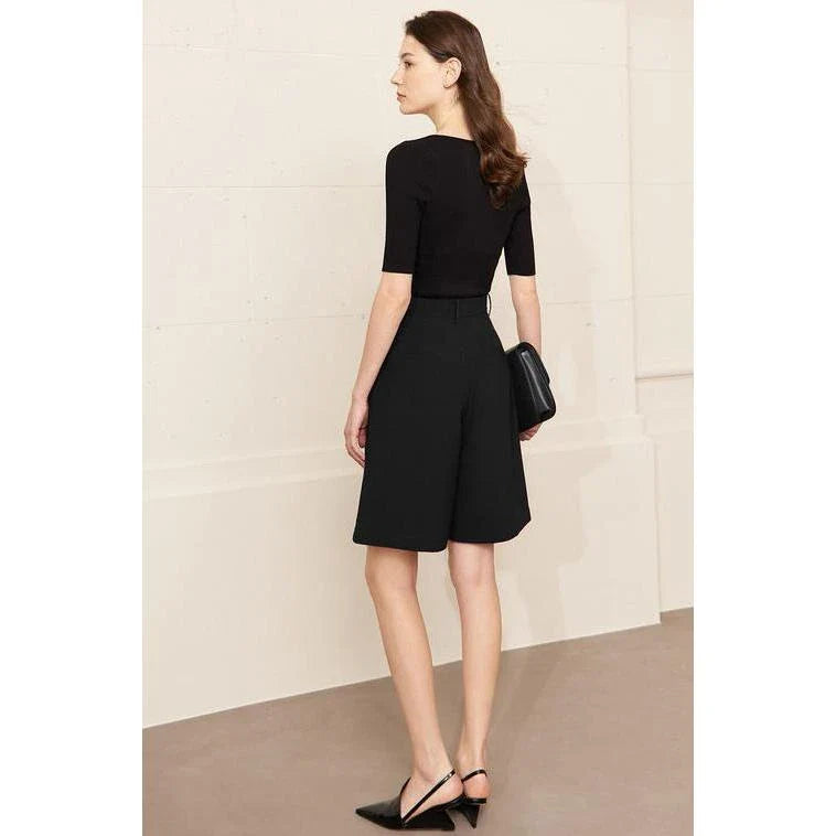 Elegant wide-leg shirred shorts for women, featuring a refined design and comfortable fit for the British summer