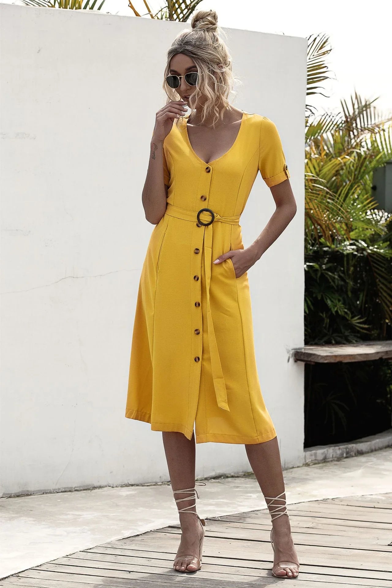 Stylish lace-up button dress in a soft, breathable cotton-blend fabric with a flattering middle waist silhouette
