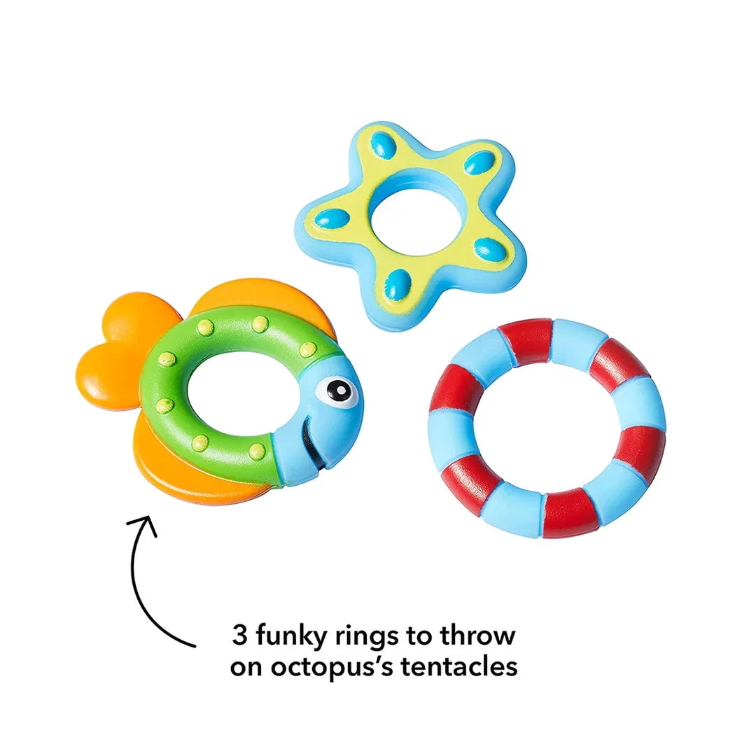 A purple octopus bath toy with colourful rings for tossing and splashing in the water