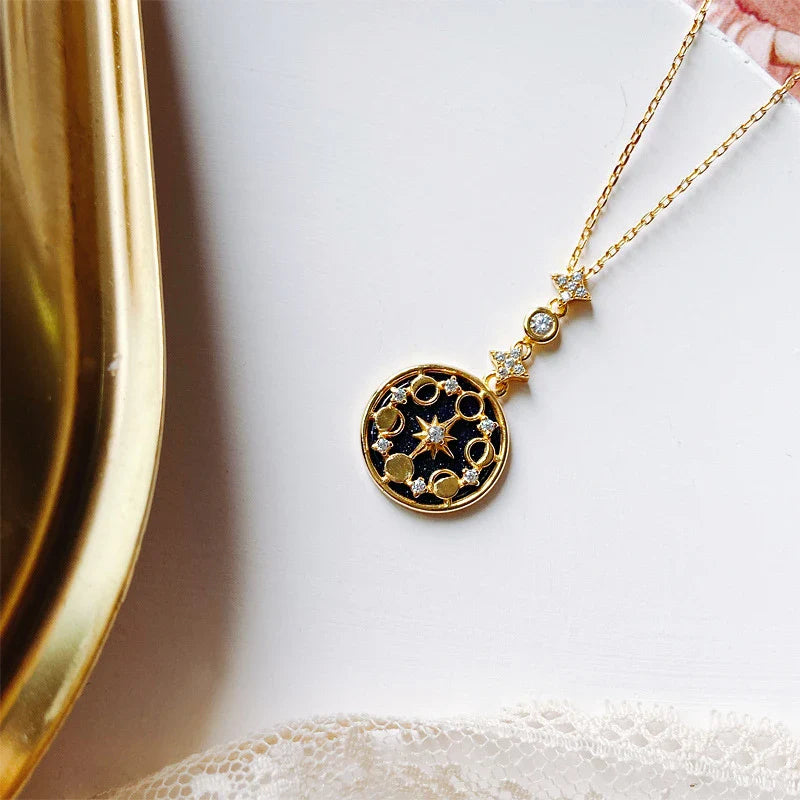 Elegant silver necklace with diamond detailing, geometric pattern, and adjustable length