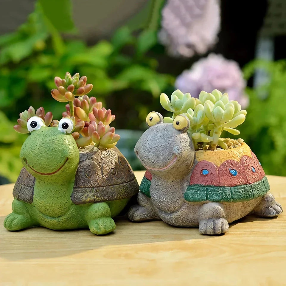 A charming, hand-painted resin planter in the shape of a cartoon turtle, perfect for displaying succulents, cacti, and other small plants.