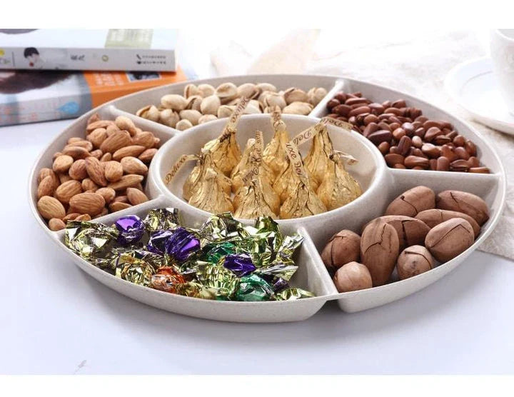Stylish round snack plate in green and khaki colours, perfect for serving fruit, nuts, or hors d'oeuvres at UK dinner parties and tea times.
