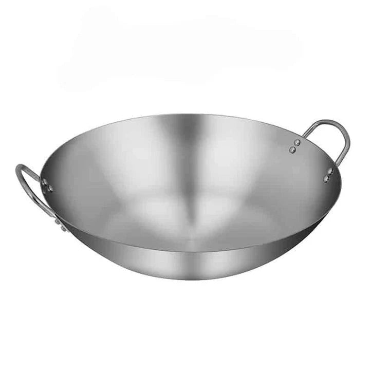 Premium British-made cast iron wok pan with superior heat retention and even heat distribution for versatile cooking