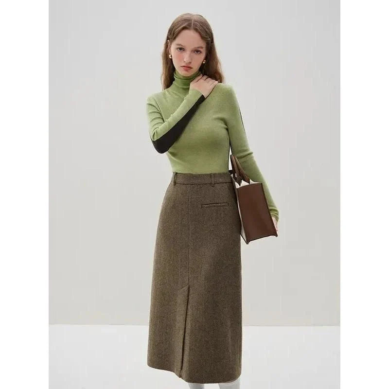 Sophisticated wool blazer and skirt set for professional women, featuring a chic double-breasted jacket and an elegant long skirt with a stylish front split