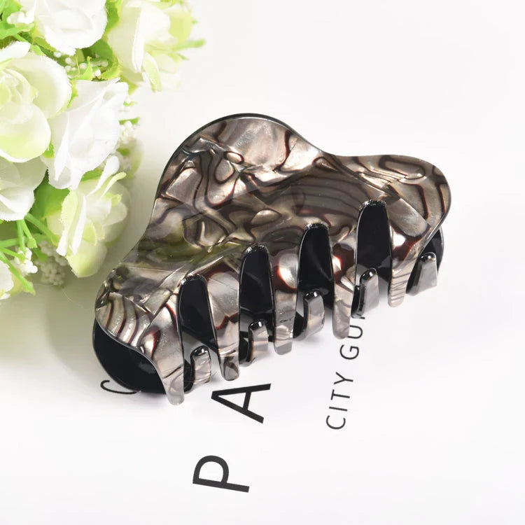 Elegant large floral acrylic hair clips in various colours for a sophisticated look