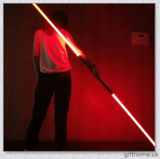 Premium dual-bladed lightsaber with sleek silver hilt, vibrant light modes, and sound effects for authentic Star Wars gameplay