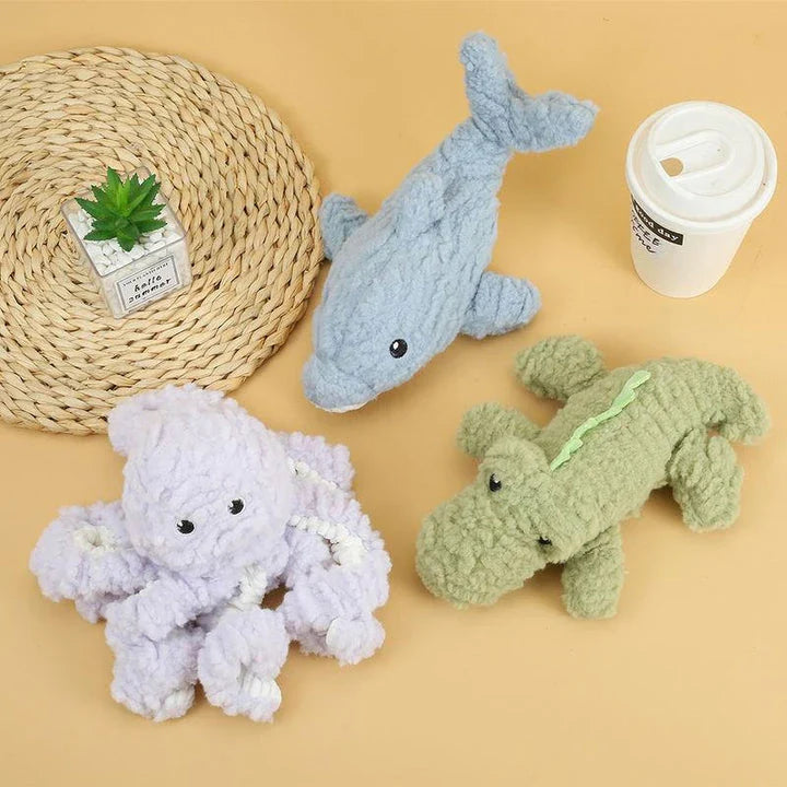Plush crocodile-shaped squeaky dog toy made of durable, bite-resistant fleece material