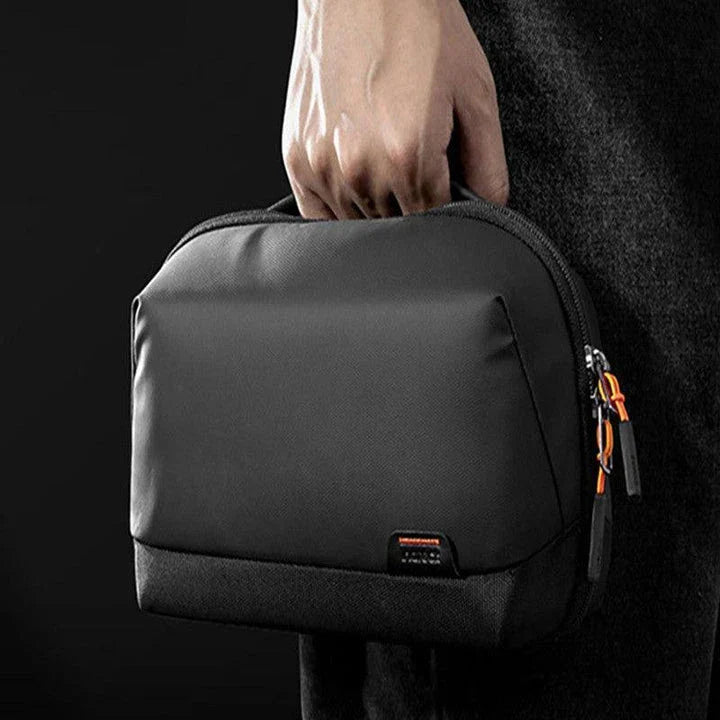 A stylish and waterproof travel organiser bag with cable storage compartment, perfect for keeping your tech essentials organised and protected on the go.