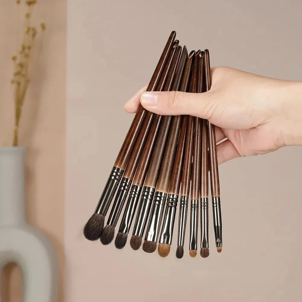 A set of 10 high-quality eye makeup brushes in various shapes and sizes, perfect for blending, shading, and defining the eyes