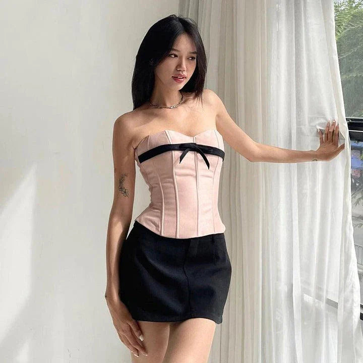 Stylish bow-accented waist back fashion in pink, made with premium polyester for a comfortable and flattering fit.