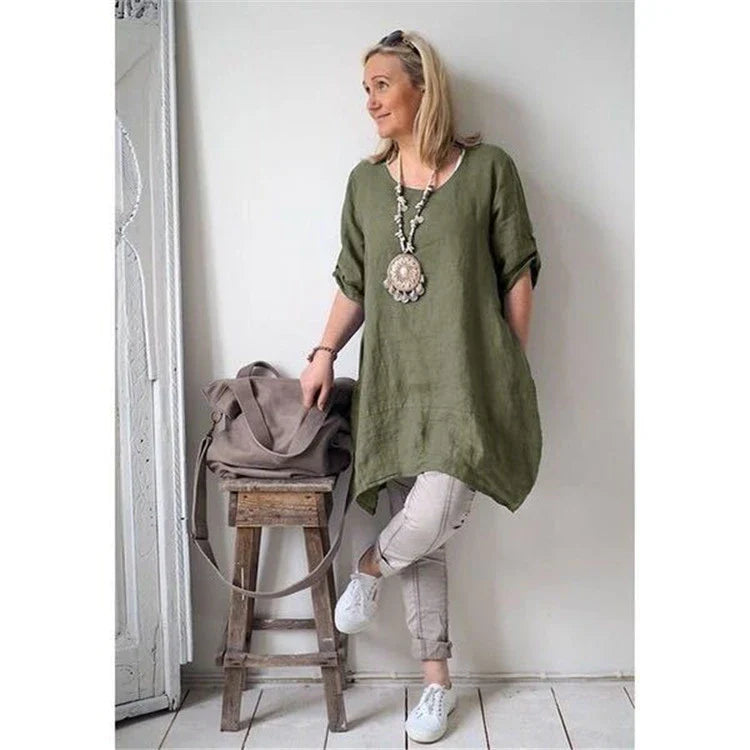 Irregular hem dress in a stylish beige colour, featuring a unique asymmetrical hemline and a comfortable cotton blend fabric