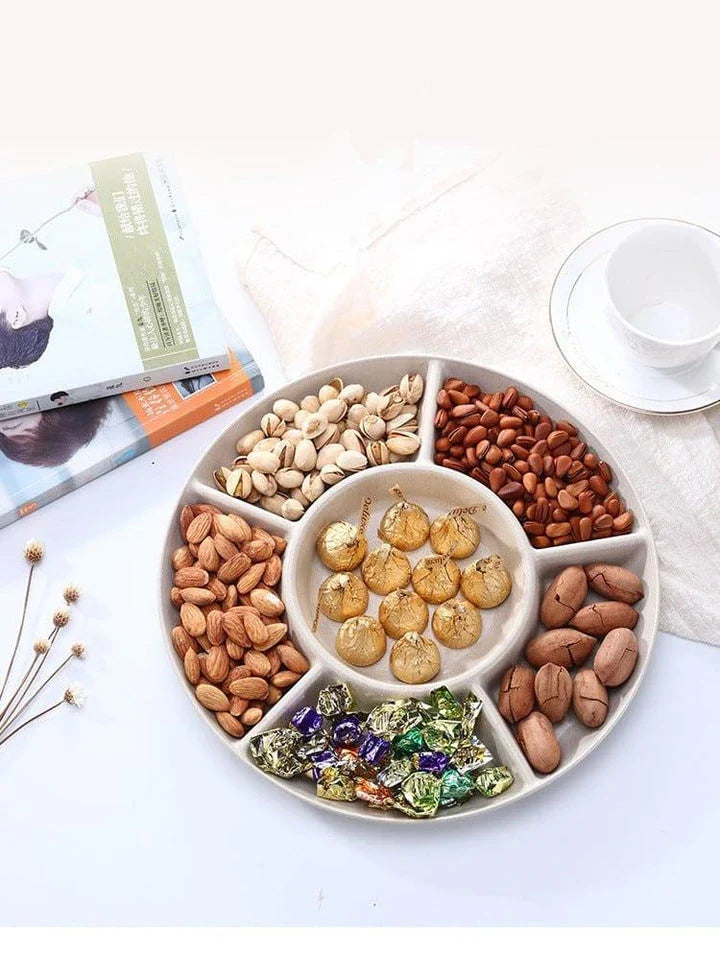 Stylish round snack plate in green and khaki colours, perfect for serving fruit, nuts, or hors d'oeuvres at UK dinner parties and tea times.