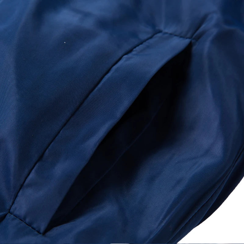 Men's slim-fit hooded jacket with camouflage print, zippered pocket, and premium chemical fibre blend fabric