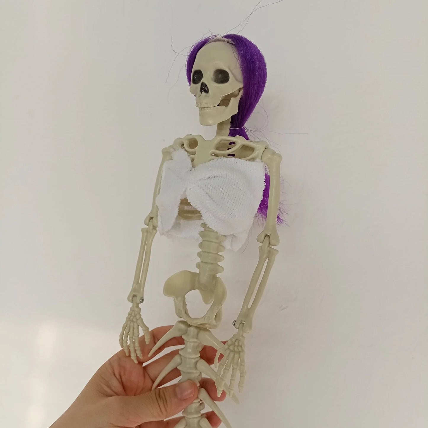 Mermaid bone pendant decoration in brown, dark purple, burgundy, and lake blue colours, ideal for Halloween outdoor courtyard displays