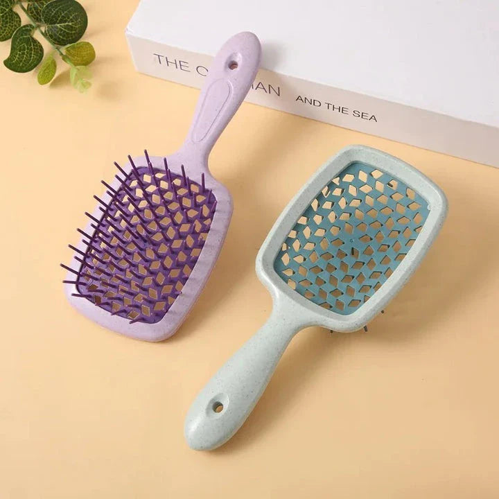 DetanglePro Air Cushion Hair Comb in vibrant colours, designed to effortlessly detangle and smooth all hair types