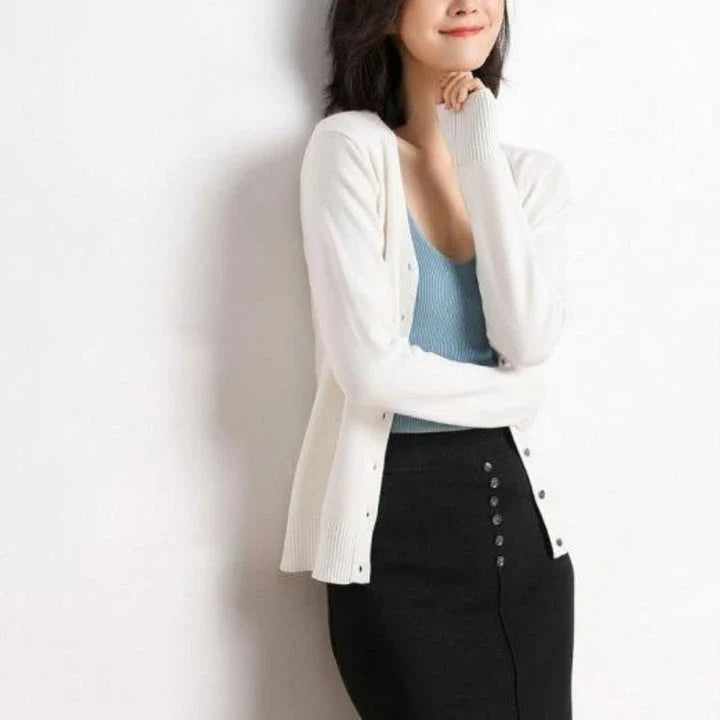 Chic v-neck single breasted cardigan in blue, green, and pink colours with a sophisticated and timeless design