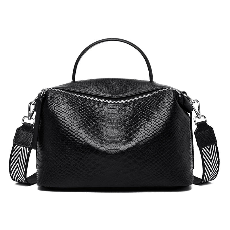Premium first-layer cowhide leather messenger bag with adjustable strap and multiple compartments for organised storage