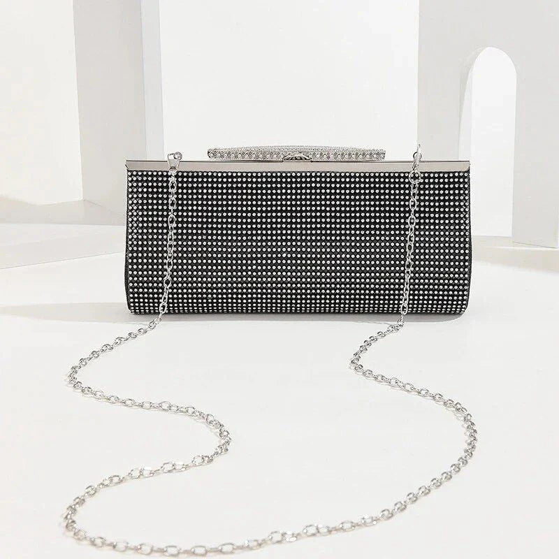 Glamorous gold rhinestone evening clutch with elegant chain and diamond decorations, perfect for UK special occasions
