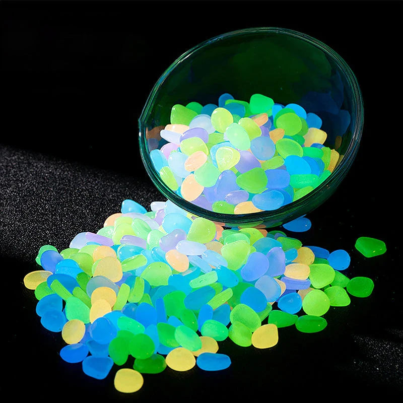 Enchanting glow-in-the-dark decorative pebbles illuminating a garden pathway at night