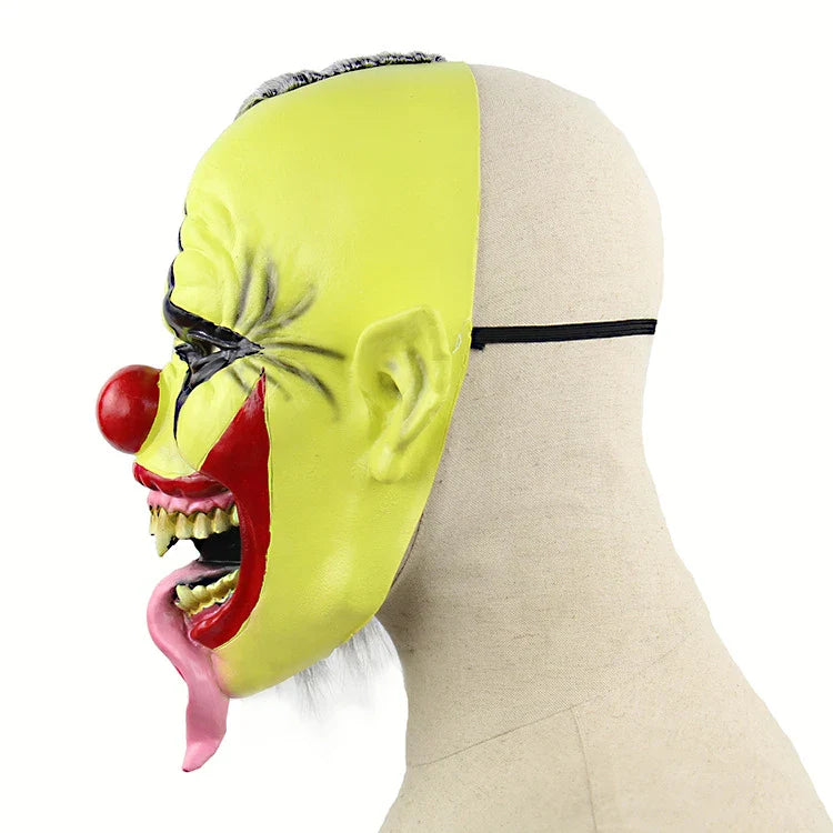 A chilling green-faced clown latex mask with a lifelike and unsettling expression, perfect for Halloween and Christmas festivities.