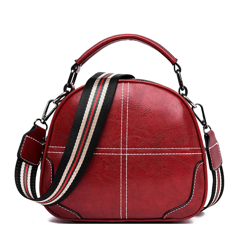 Premium PU leather shoulder bag with stitched design and multiple internal pockets for versatile, organised storage