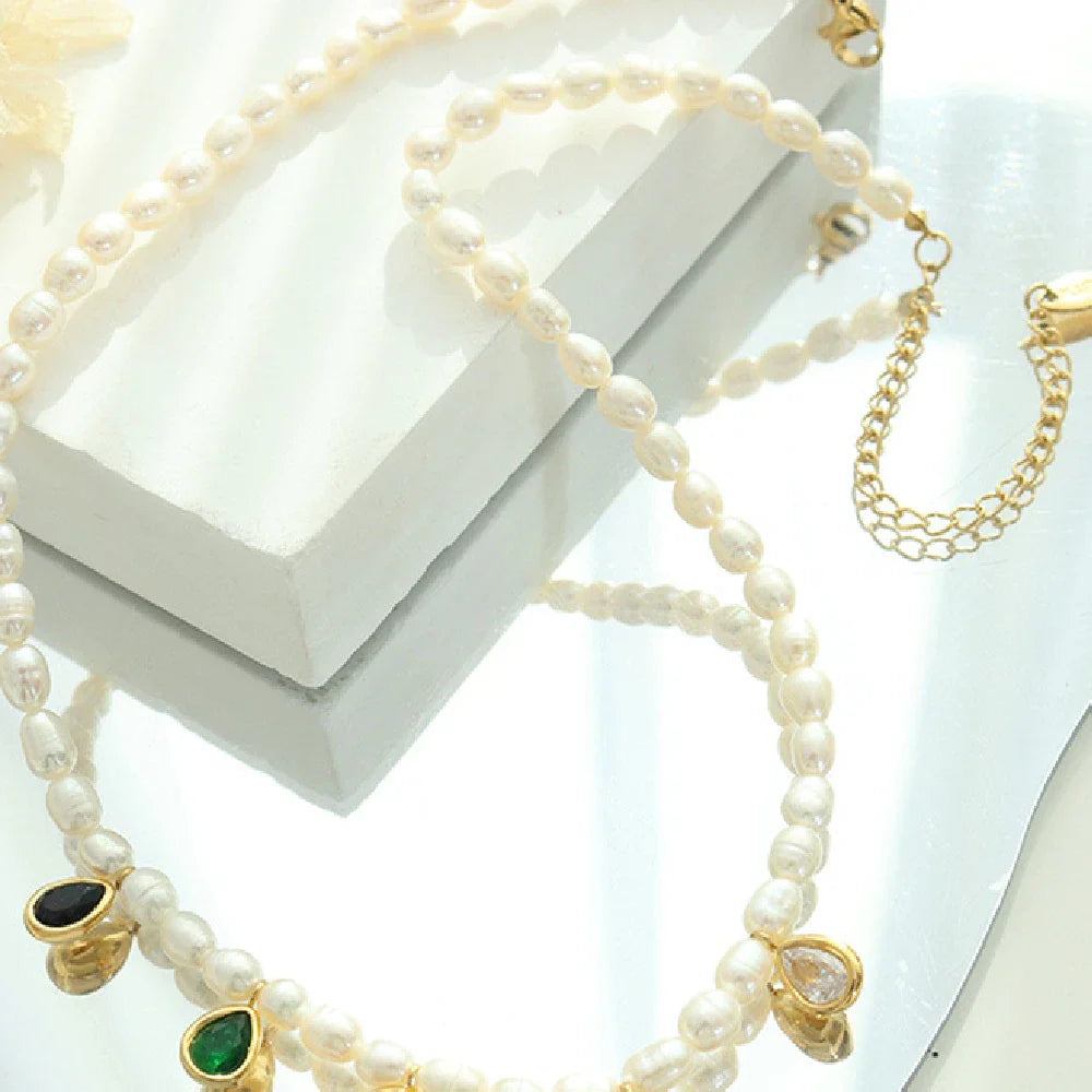 Elegant titanium steel necklace with a minimalist, sophisticated design and a polished, golden finish
