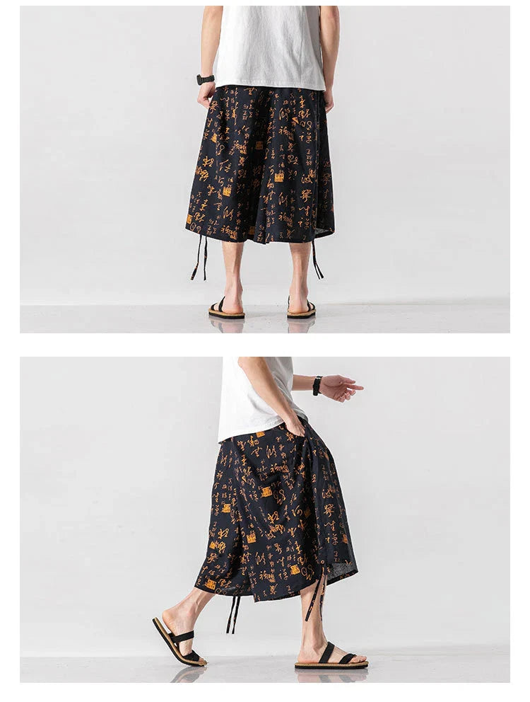 Men's loose-fitting Chinese-inspired cropped pants with a dragon or elephant floral pattern in navy blue, red, or coffee colours