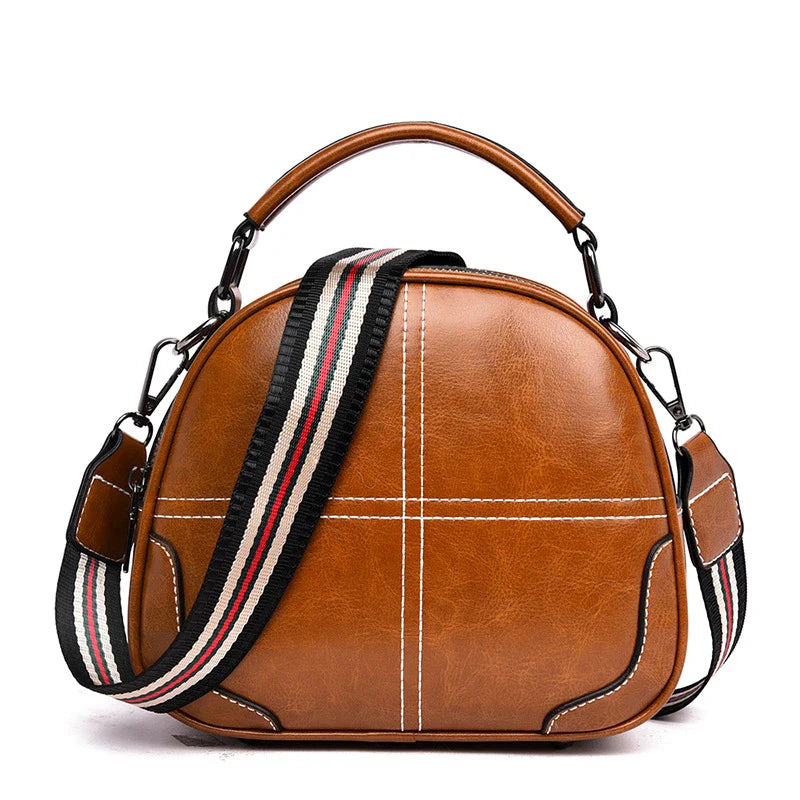 Premium PU leather shoulder bag with stitched design and multiple internal pockets for versatile, organised storage