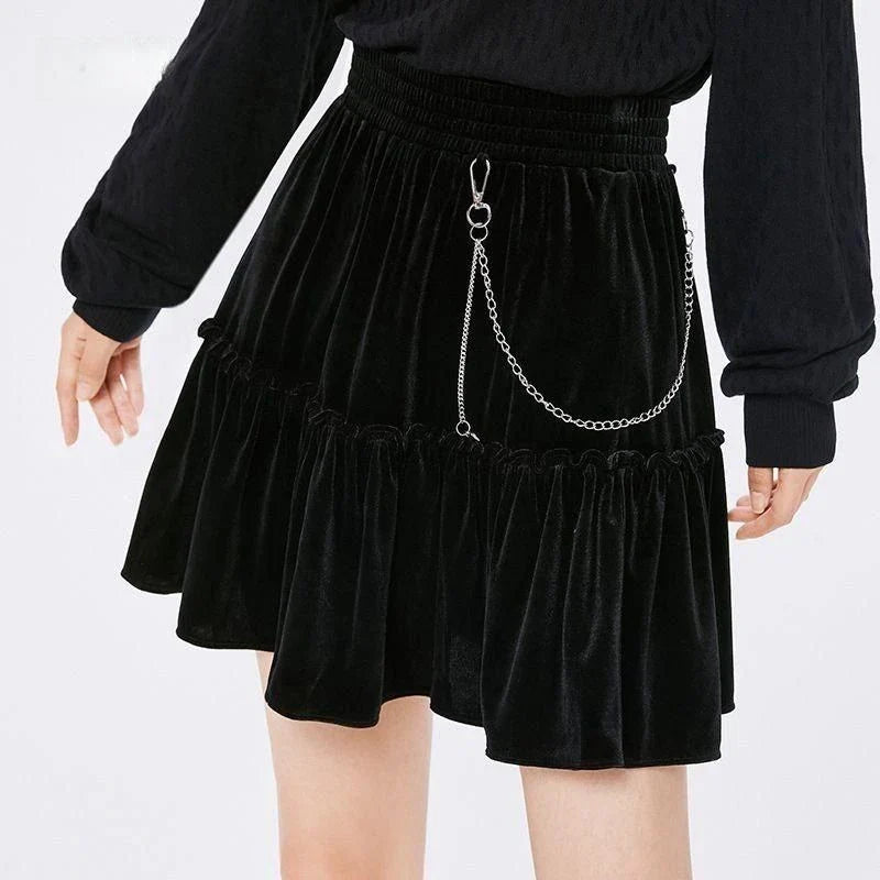A stylish and playful above-knee mini skirt with intricate chain detailing, offering a versatile and fashionable addition to any wardrobe.