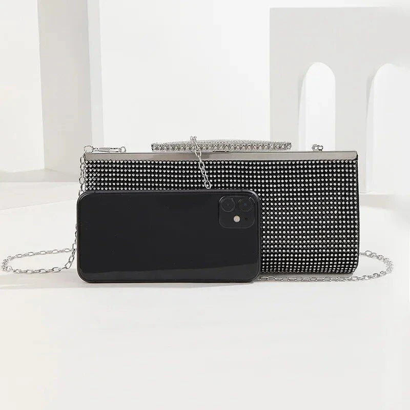 Glamorous gold rhinestone evening clutch with elegant chain and diamond decorations, perfect for UK special occasions