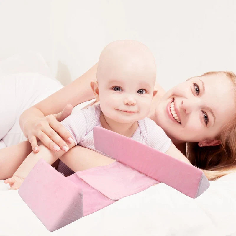 Soft, breathable cotton newborn baby sleeping pillow with adjustable fit and triangular anti-roll design for a comfortable, secure sleeping experience