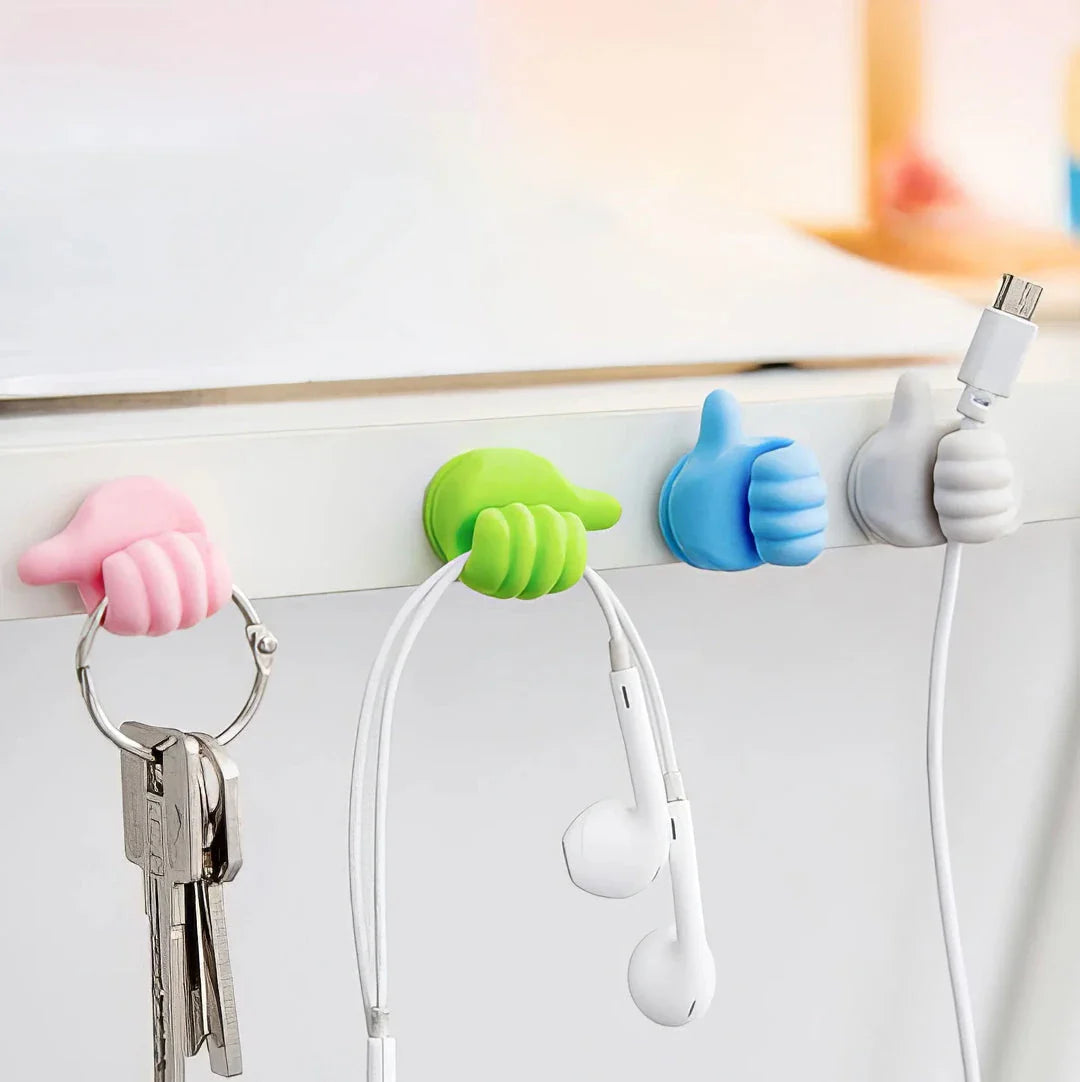 Hand-shaped silicone hooks in blue colour, used to organise desks, bathrooms, and cars